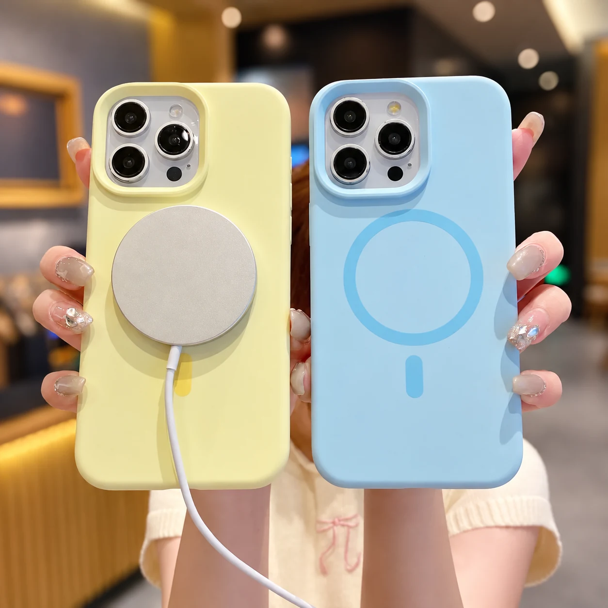 Yellow and blue silicone cases with a wireless charging puck